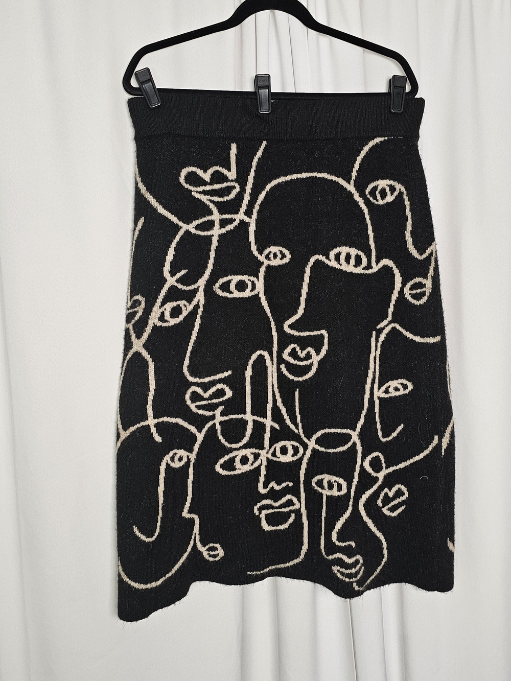 Studio Black Knit Midi Skirt with Cream Abstract Face Pattern